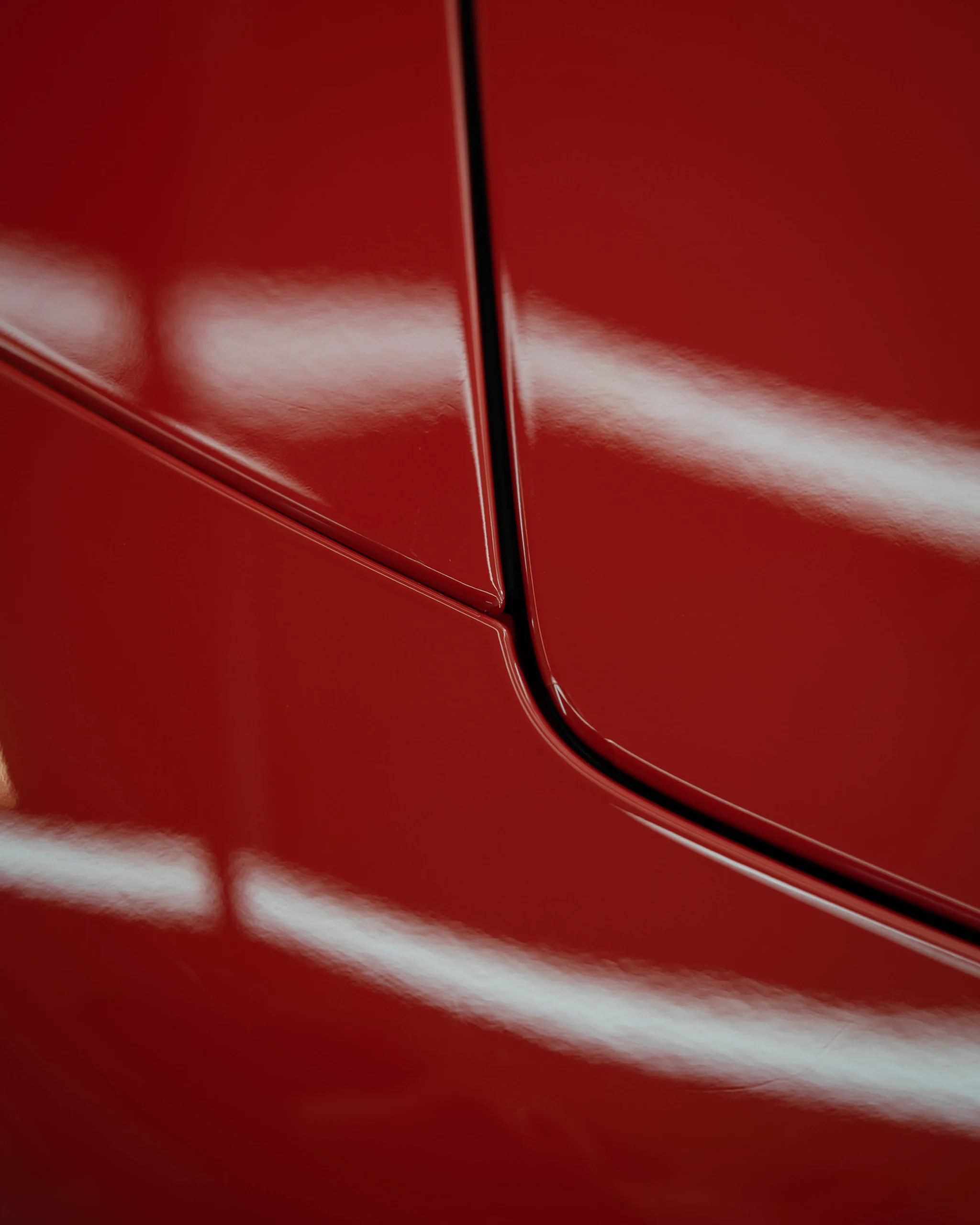 Ein Porsche 911 (992) Carrera GTS in Indischrot welcher eine exzellent angebrachte Lackschutzfolie erhielt.